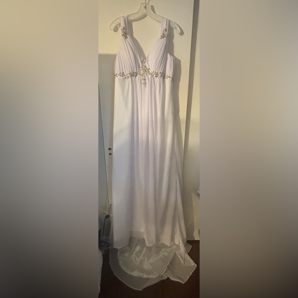 Elegant White Wedding Gown with Embellishments